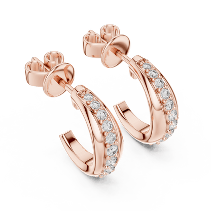 Classic diamond hoop earrings featuring a sleek curved design with sparkling round stone accents and a polished finish by Orova Jewels.