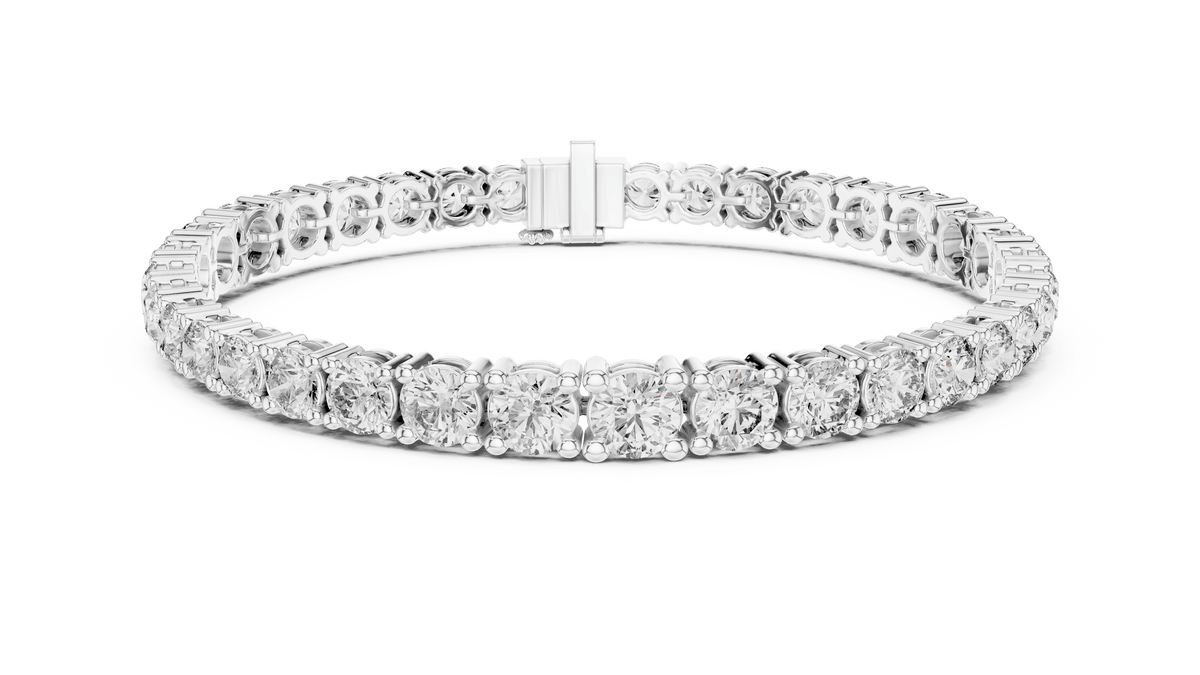 Round Brilliant Diamond Tennis Bracelet featuring a continuous row of sparkling round-cut diamonds in a classic four-prong setting with a secure box clasp by Orova Jewels.