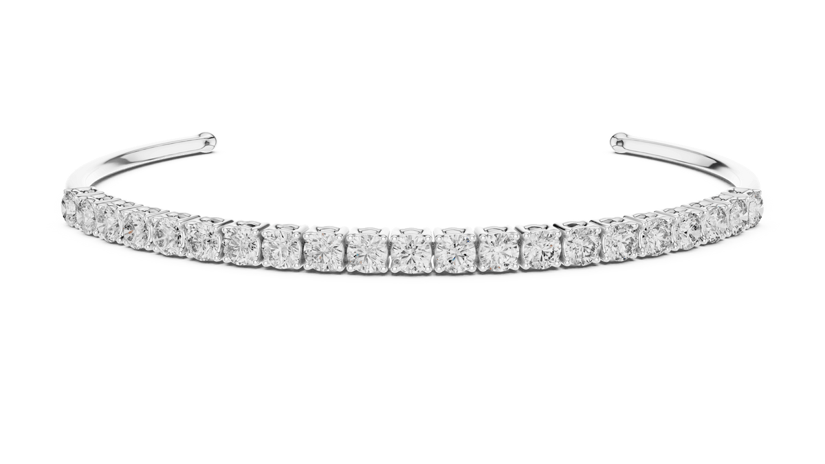 Round Diamond Open Cuff Bangle featuring a row of brilliant round-cut diamonds on a polished white gold open bracelet by Orova Jewels.