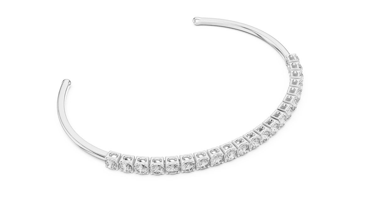 Round Diamond Open Cuff Bangle featuring a row of brilliant round-cut diamonds on a polished white gold open bracelet by Orova Jewels.