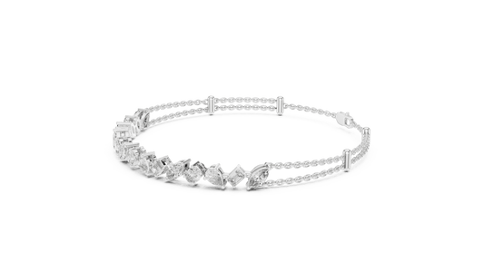 Marquise and emerald diamond tennis bracelet featuring mixed-cut sparkling stones in an elegant chain design by Orova Jewels.