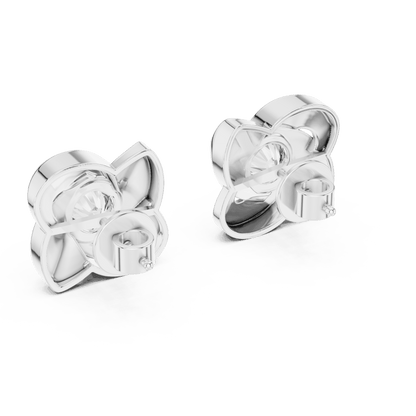Twisted ribbon diamond stud earrings featuring a brilliant round center stone with a modern swirl design by Orova Jewels.