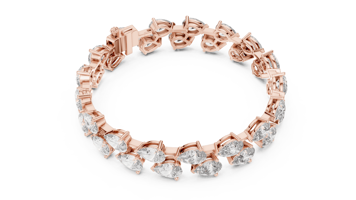Pear Cut Diamond Tennis Bracelet featuring a double row of sparkling pear-shaped stones with a secure box clasp by Orova Jewels.