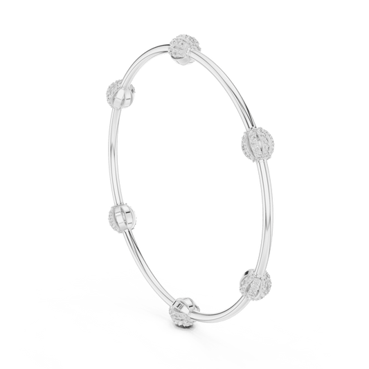 Elegant pavé crystal charm bangle bracelet featuring sparkling bead accents on a sleek polished silver-tone bangle by Orova Jewels.