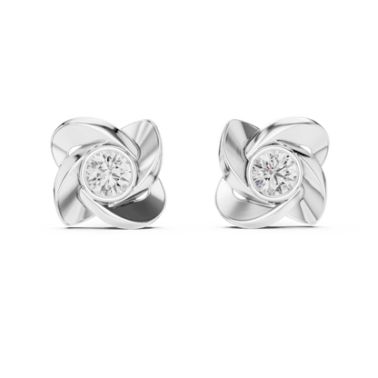 Twisted ribbon diamond stud earrings featuring a brilliant round center stone with a modern swirl design by Orova Jewels.