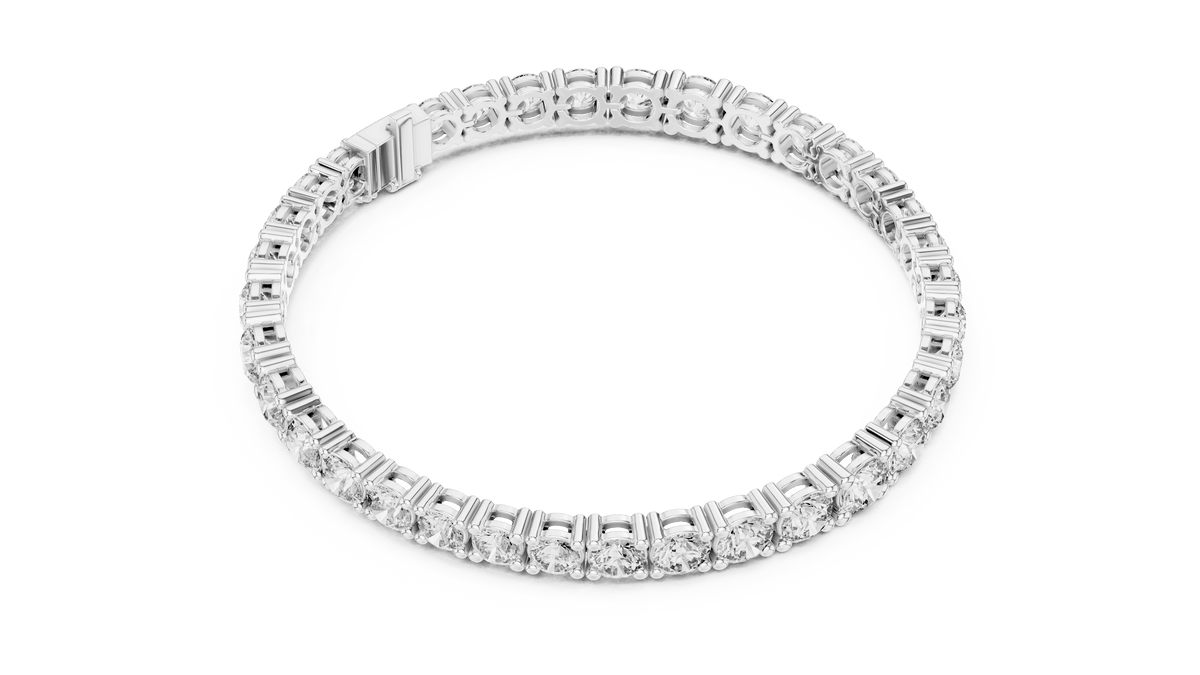 Round Brilliant Diamond Tennis Bracelet featuring a continuous row of sparkling round-cut diamonds in a classic four-prong setting with a secure box clasp by Orova Jewels.