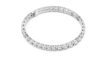 Round Brilliant Diamond Tennis Bracelet featuring a continuous row of sparkling round-cut diamonds in a classic four-prong setting with a secure box clasp by Orova Jewels.