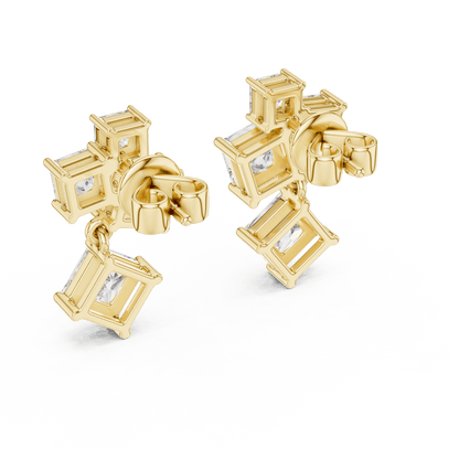 Princess cut diamond cluster drop earrings featuring cascading square-cut stones in a modern geometric design by Orova Jewels.