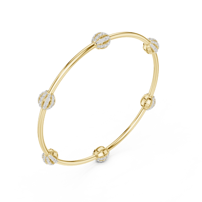 Elegant pavé crystal charm bangle bracelet featuring sparkling bead accents on a sleek polished silver-tone bangle by Orova Jewels.
