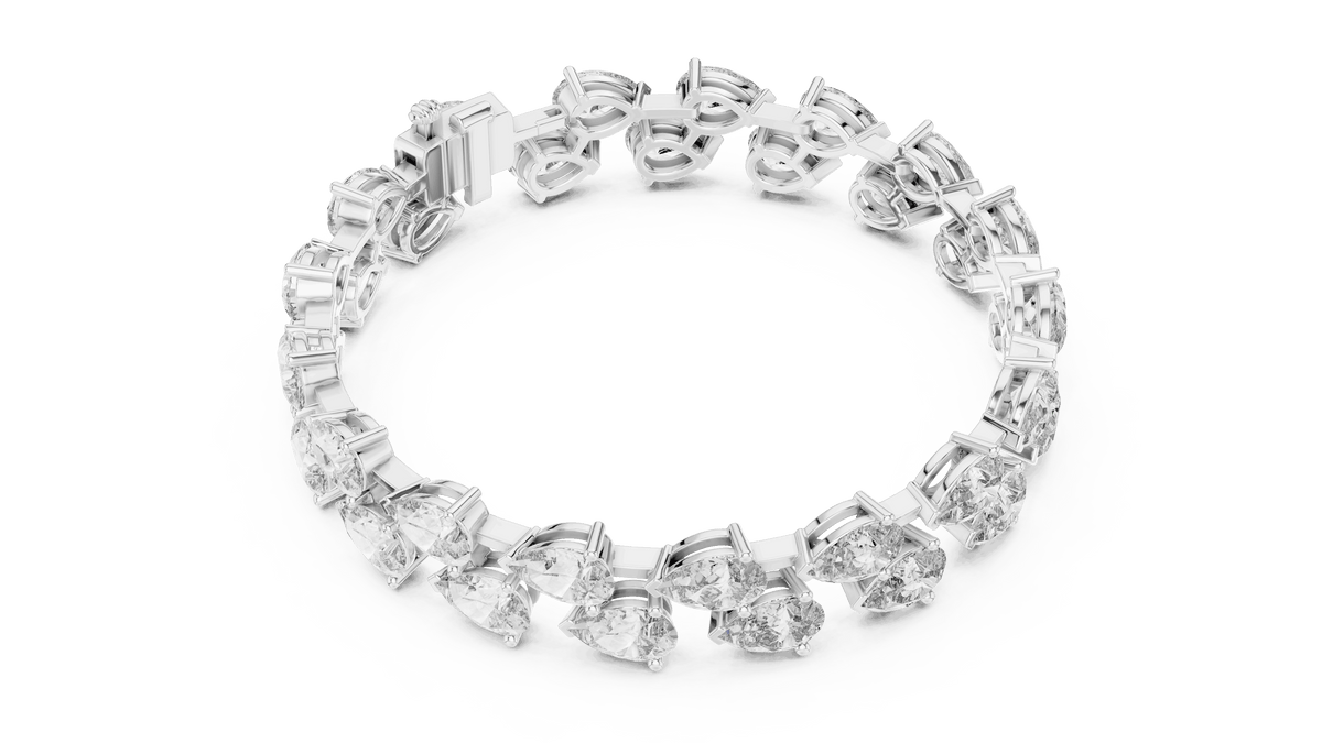 Pear Cut Diamond Tennis Bracelet featuring a double row of sparkling pear-shaped stones with a secure box clasp by Orova Jewels.