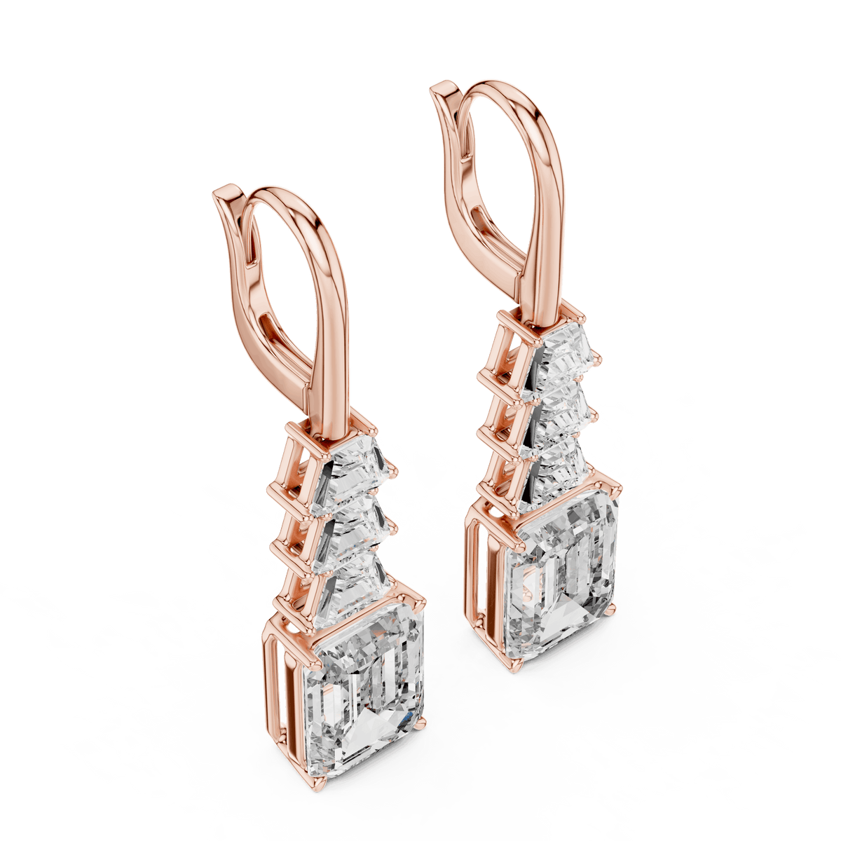 Elegant emerald cut diamond drop earrings featuring a geometric drop design with sparkling emerald-cut stones by Orova Jewels.