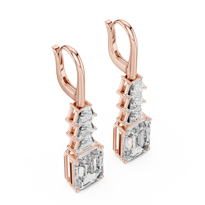 Elegant emerald cut diamond drop earrings featuring a geometric drop design with sparkling emerald-cut stones by Orova Jewels.