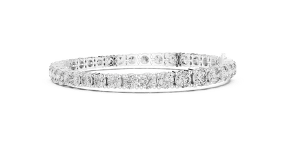 Round Brilliant Diamond Tennis Bracelet featuring a continuous row of sparkling round-cut diamonds in a classic four-prong setting with a secure box clasp by Orova Jewels.