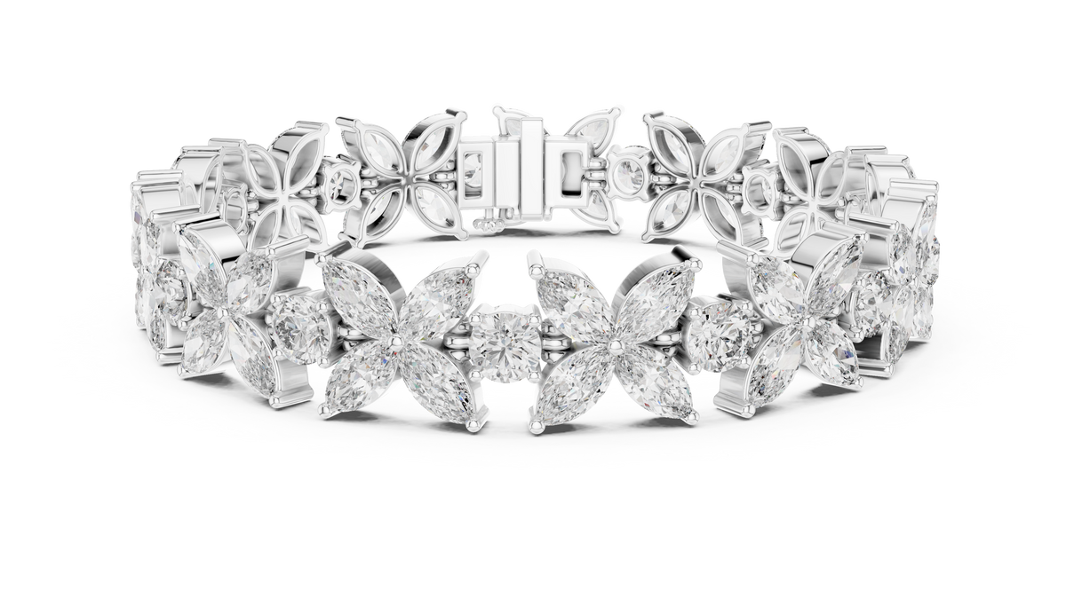 Marquise Floral Diamond Tennis Bracelet featuring sparkling flower motifs crafted with marquise-cut and round brilliant stones in a polished white gold finish by Orova Jewels.