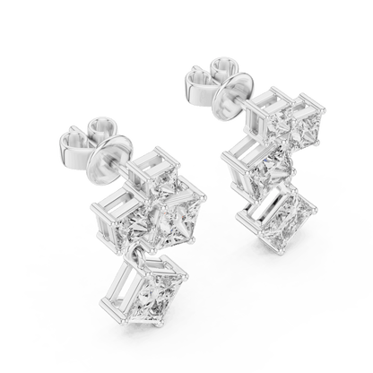 Princess cut diamond cluster drop earrings featuring cascading square-cut stones in a modern geometric design by Orova Jewels.