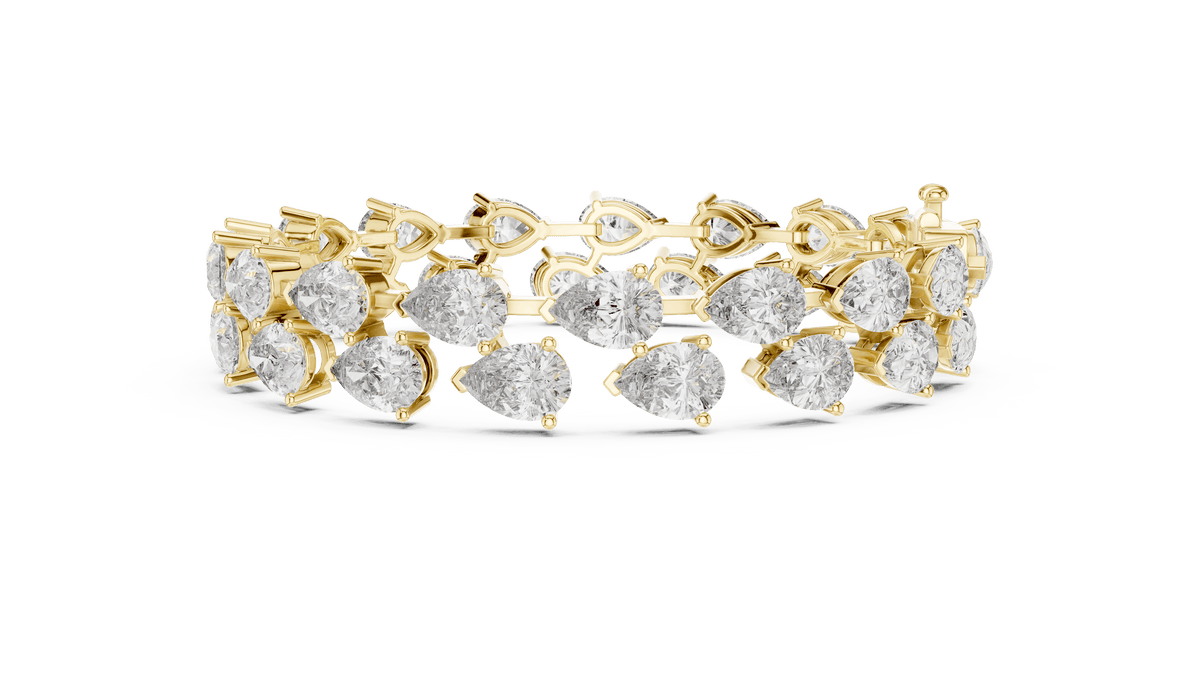 Pear Cut Diamond Tennis Bracelet featuring a double row of sparkling pear-shaped stones with a secure box clasp by Orova Jewels.