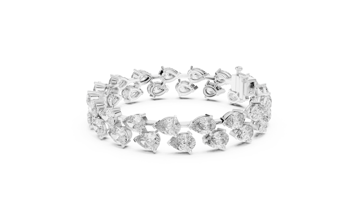 Pear Cut Diamond Tennis Bracelet featuring a double row of sparkling pear-shaped stones with a secure box clasp by Orova Jewels.