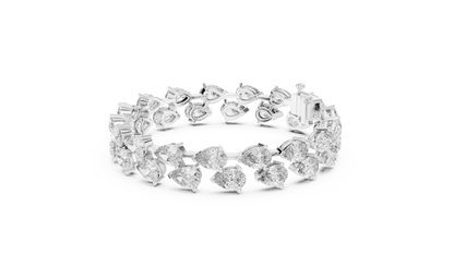 Pear Cut Diamond Tennis Bracelet featuring a double row of sparkling pear-shaped stones with a secure box clasp by Orova Jewels.