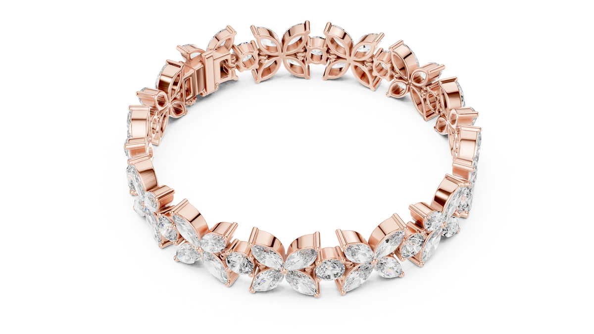 Marquise Floral Diamond Tennis Bracelet featuring sparkling flower motifs crafted with marquise-cut and round brilliant stones in a polished white gold finish by Orova Jewels.