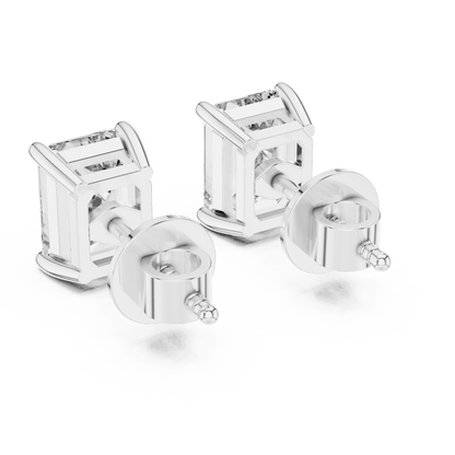 Emerald cut solitaire diamond stud earrings featuring rectangular-cut stones in a classic four-prong setting with secure screw-back closure by Orova Jewels.