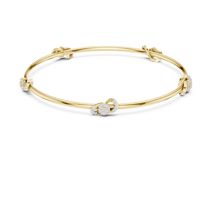 Minimalist floral crystal bangle bracelet featuring delicate flower-inspired charms on a sleek polished silver-tone bangle by Orova Jewels.