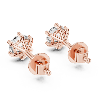 Round solitaire diamond stud earrings featuring brilliant round-cut stones in a classic six-prong setting with secure screw-back closure by Orova Jewels.