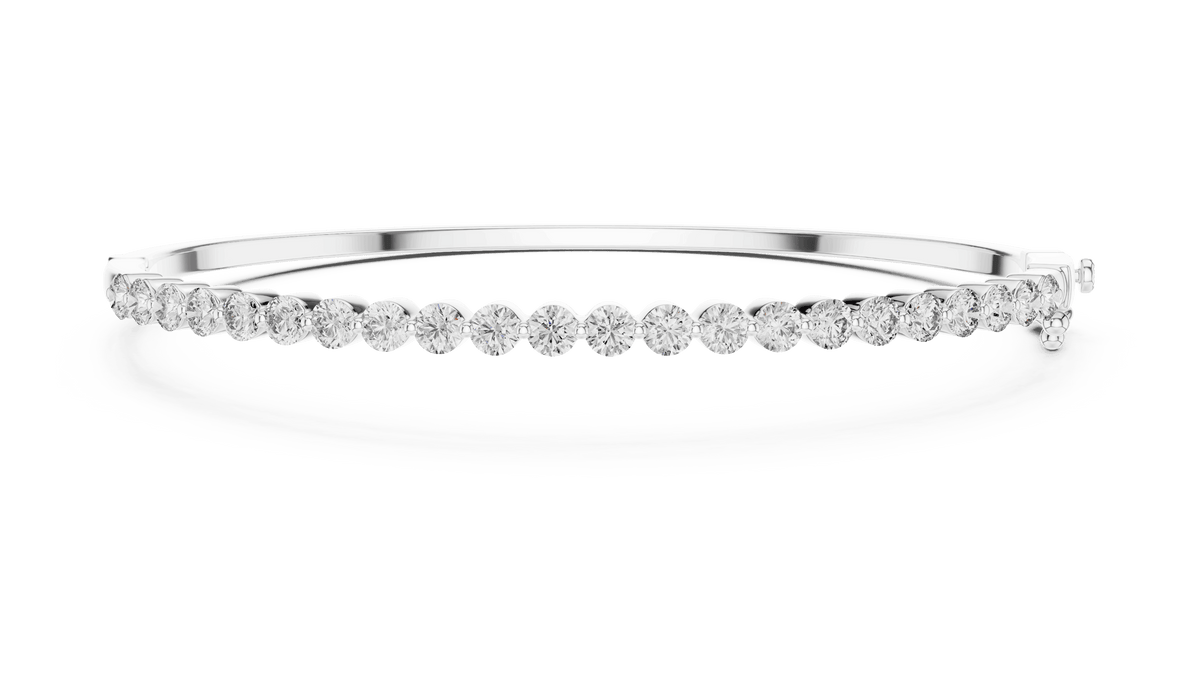 Classic round diamond hinged bangle featuring brilliant round-cut diamonds set along a polished white gold bracelet with a secure clasp by Orova Jewels.