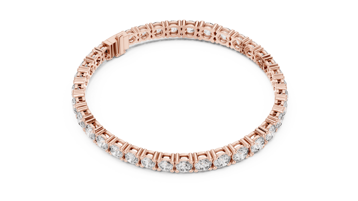 Round Brilliant Diamond Tennis Bracelet featuring a continuous row of sparkling round-cut diamonds in a classic four-prong setting with a secure box clasp by Orova Jewels.