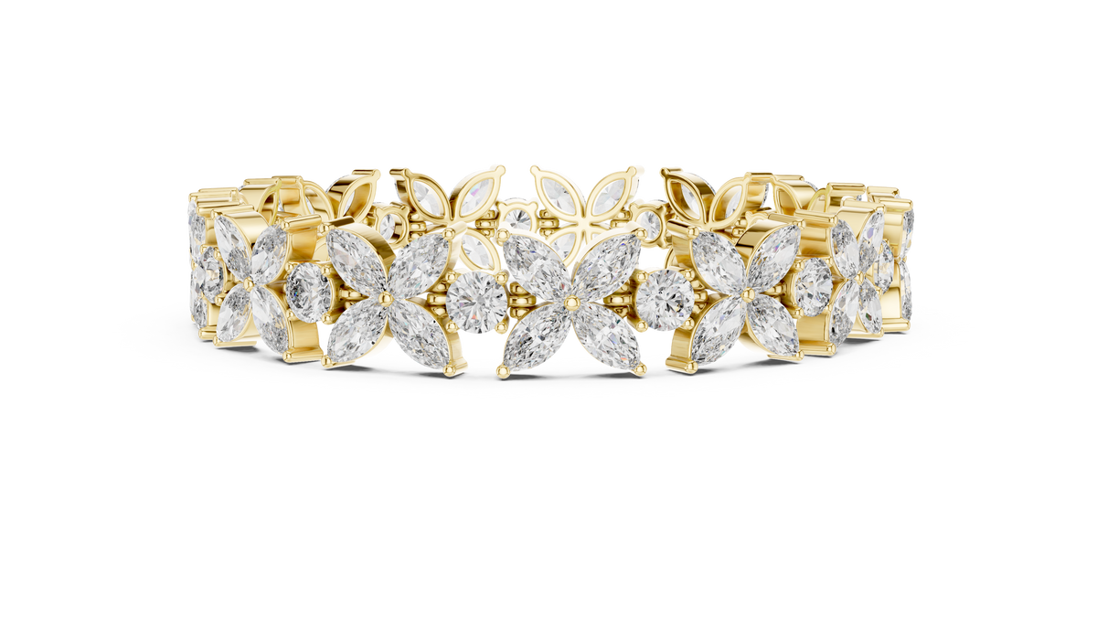 Marquise Floral Diamond Tennis Bracelet featuring sparkling flower motifs crafted with marquise-cut and round brilliant stones in a polished white gold finish by Orova Jewels.