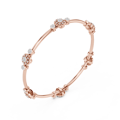 Floral charm crystal bangle bracelet featuring sparkling flower charms, decorative spacer beads, and a polished silver-tone finish by Orova Jewels.
