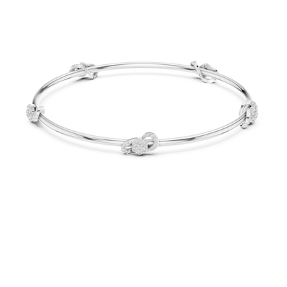 Minimalist floral crystal bangle bracelet featuring delicate flower-inspired charms on a sleek polished silver-tone bangle by Orova Jewels.