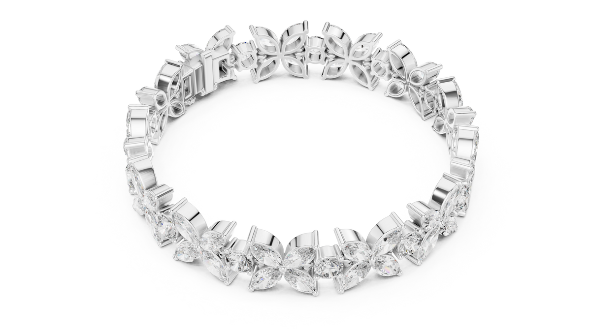 Marquise Floral Diamond Tennis Bracelet featuring sparkling flower motifs crafted with marquise-cut and round brilliant stones in a polished white gold finish by Orova Jewels.