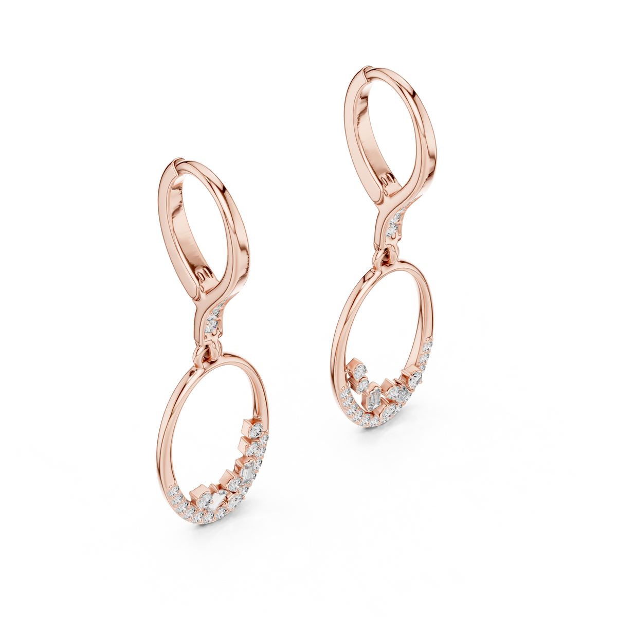 Oval diamond drop hoop earrings featuring an open oval frame with sparkling round and baguette-cut stone accents by Orova Jewels.