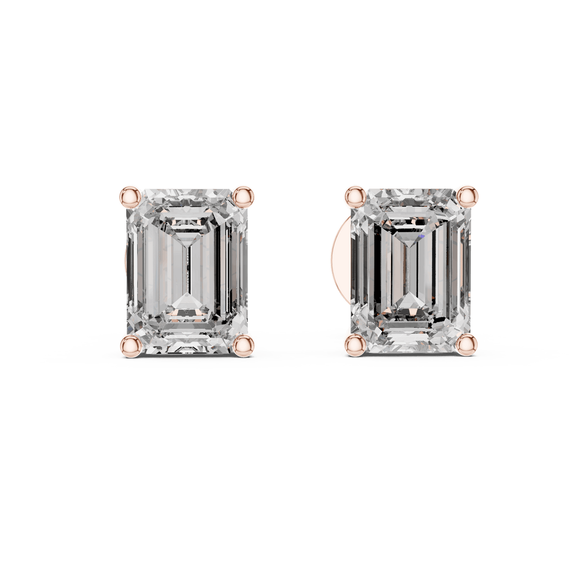 Emerald cut solitaire diamond stud earrings featuring rectangular-cut stones in a classic four-prong setting with secure screw-back closure by Orova Jewels.
