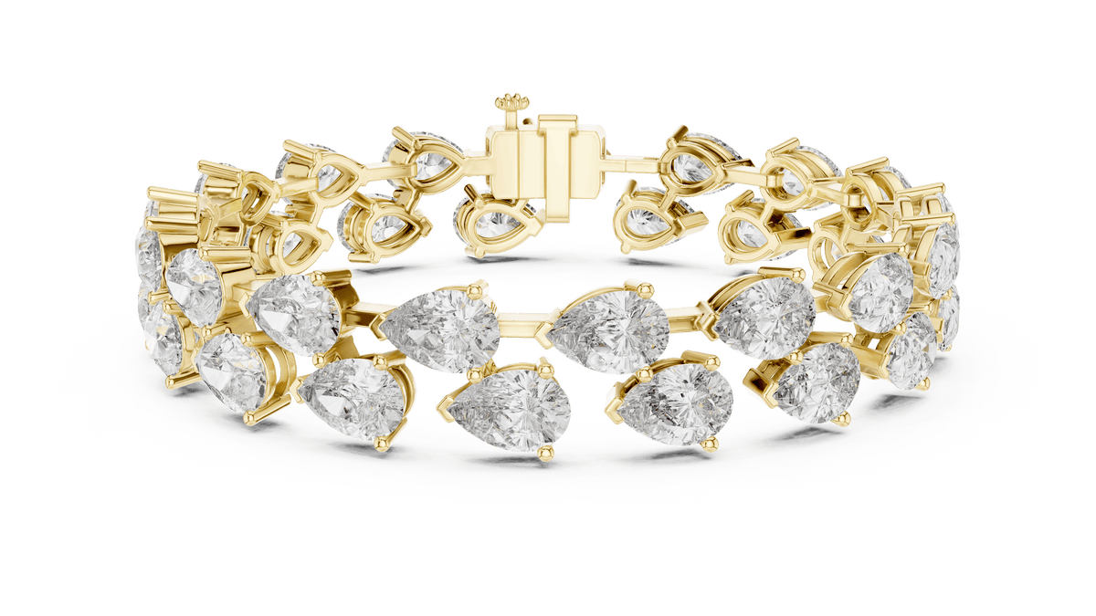 Pear Cut Diamond Tennis Bracelet featuring a double row of sparkling pear-shaped stones with a secure box clasp by Orova Jewels.