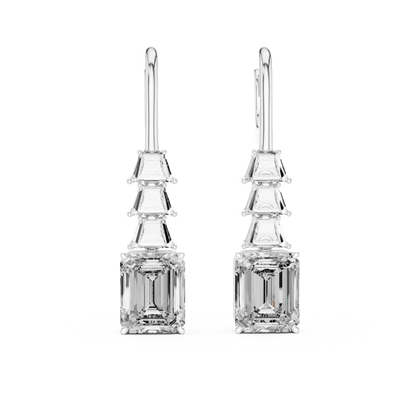 Elegant emerald cut diamond drop earrings featuring a geometric drop design with sparkling emerald-cut stones by Orova Jewels.