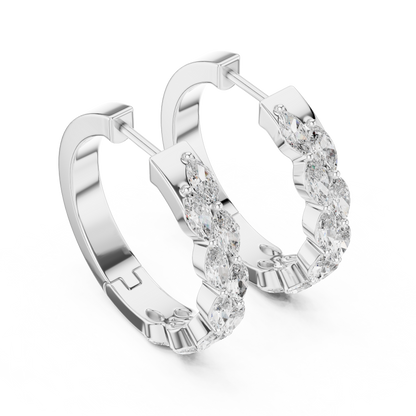 Marquise diamond hoop earrings featuring sparkling marquise-cut stones in a sleek hinged hoop design by Orova Jewels.