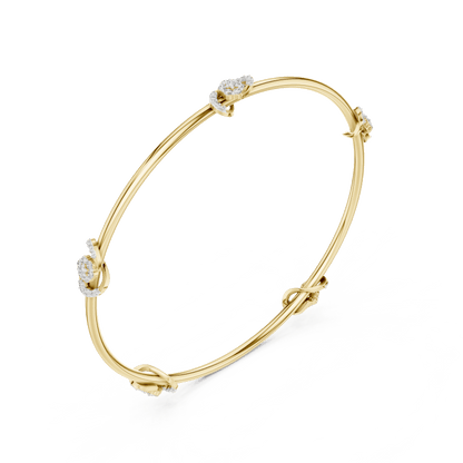 Minimalist floral crystal bangle bracelet featuring delicate flower-inspired charms on a sleek polished silver-tone bangle by Orova Jewels.