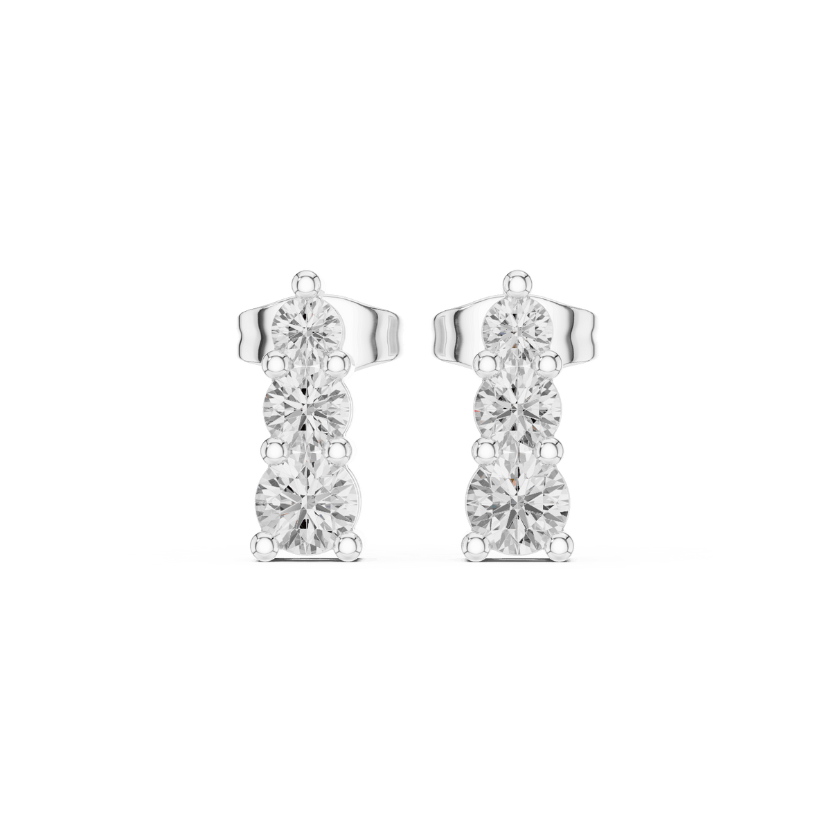 Three stone diamond drop stud earrings featuring brilliant round-cut stones in a vertical design with secure butterfly backs by Orova Jewels.