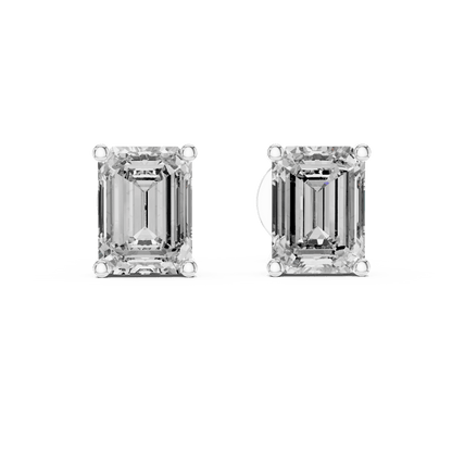 Emerald cut solitaire diamond stud earrings featuring rectangular-cut stones in a classic four-prong setting with secure screw-back closure by Orova Jewels.