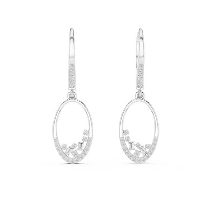 Oval diamond drop hoop earrings featuring an open oval frame with sparkling round and baguette-cut stone accents by Orova Jewels.