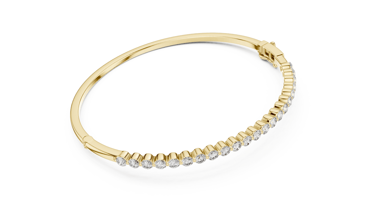 Classic round diamond hinged bangle featuring brilliant round-cut diamonds set along a polished white gold bracelet with a secure clasp by Orova Jewels.