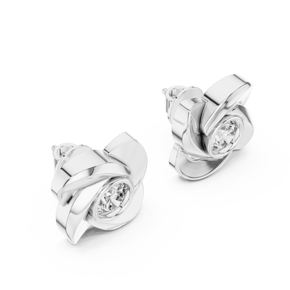 Twisted ribbon diamond stud earrings featuring a brilliant round center stone with a modern swirl design by Orova Jewels.