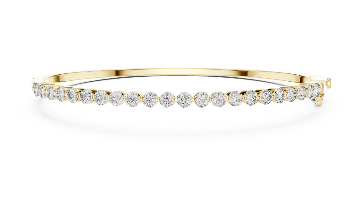 Classic round diamond hinged bangle featuring brilliant round-cut diamonds set along a polished white gold bracelet with a secure clasp by Orova Jewels.