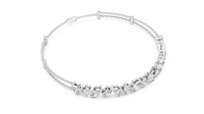 Marquise and emerald diamond tennis bracelet featuring mixed-cut sparkling stones in an elegant chain design by Orova Jewels.