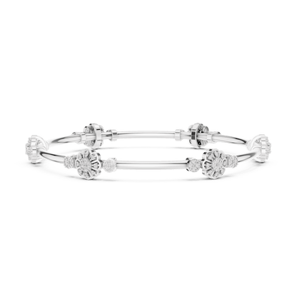 Floral charm crystal bangle bracelet featuring sparkling flower charms, decorative spacer beads, and a polished silver-tone finish by Orova Jewels.