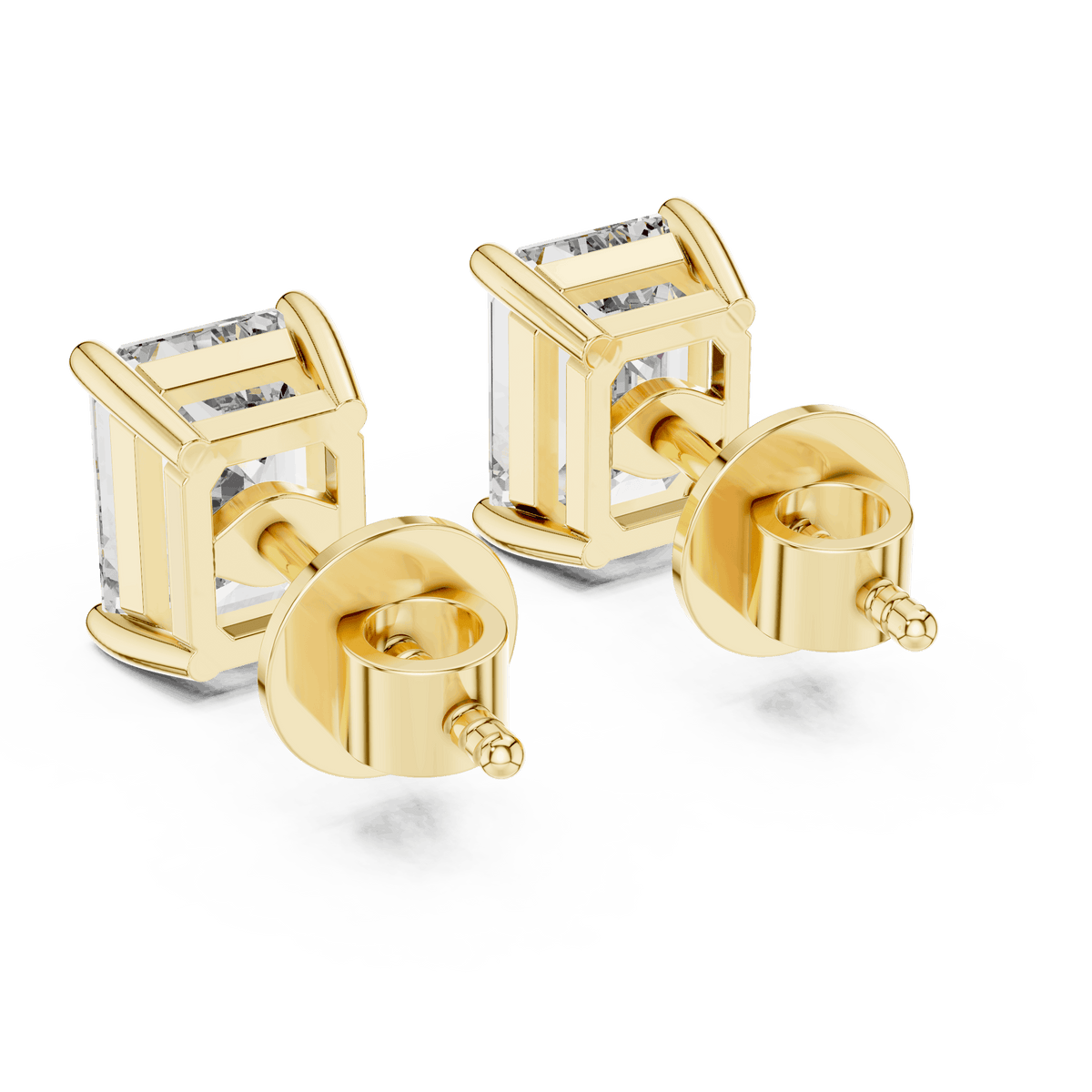 Emerald cut solitaire diamond stud earrings featuring rectangular-cut stones in a classic four-prong setting with secure screw-back closure by Orova Jewels.