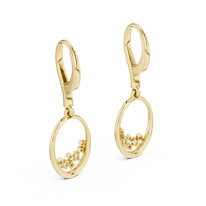 Oval diamond drop hoop earrings featuring an open oval frame with sparkling round and baguette-cut stone accents by Orova Jewels.
