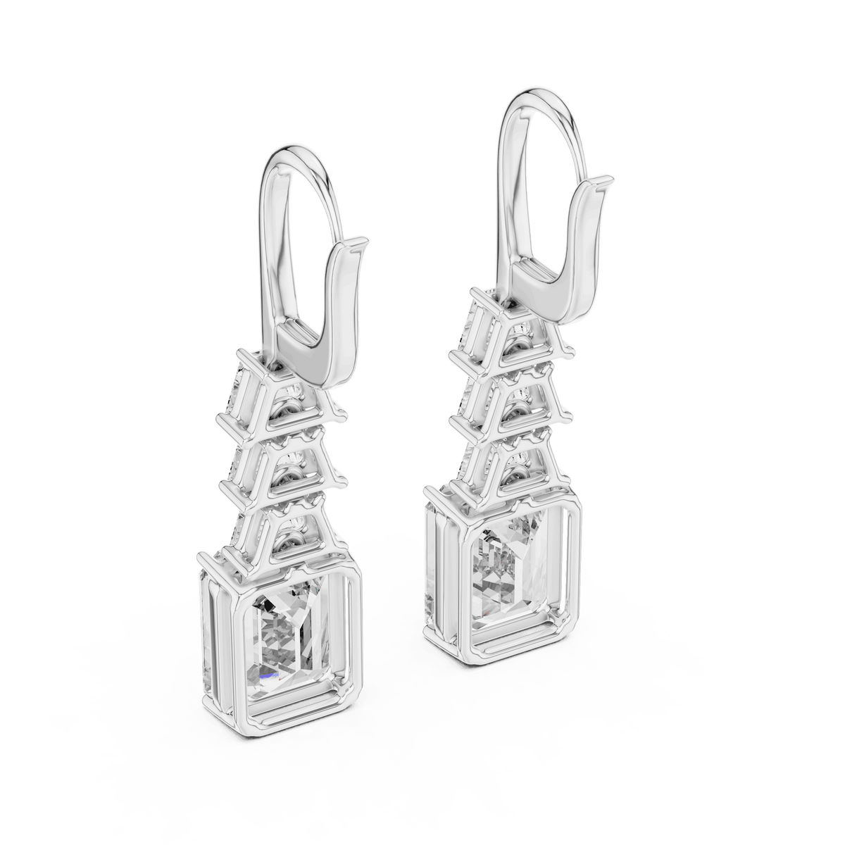Elegant emerald cut diamond drop earrings featuring a geometric drop design with sparkling emerald-cut stones by Orova Jewels.