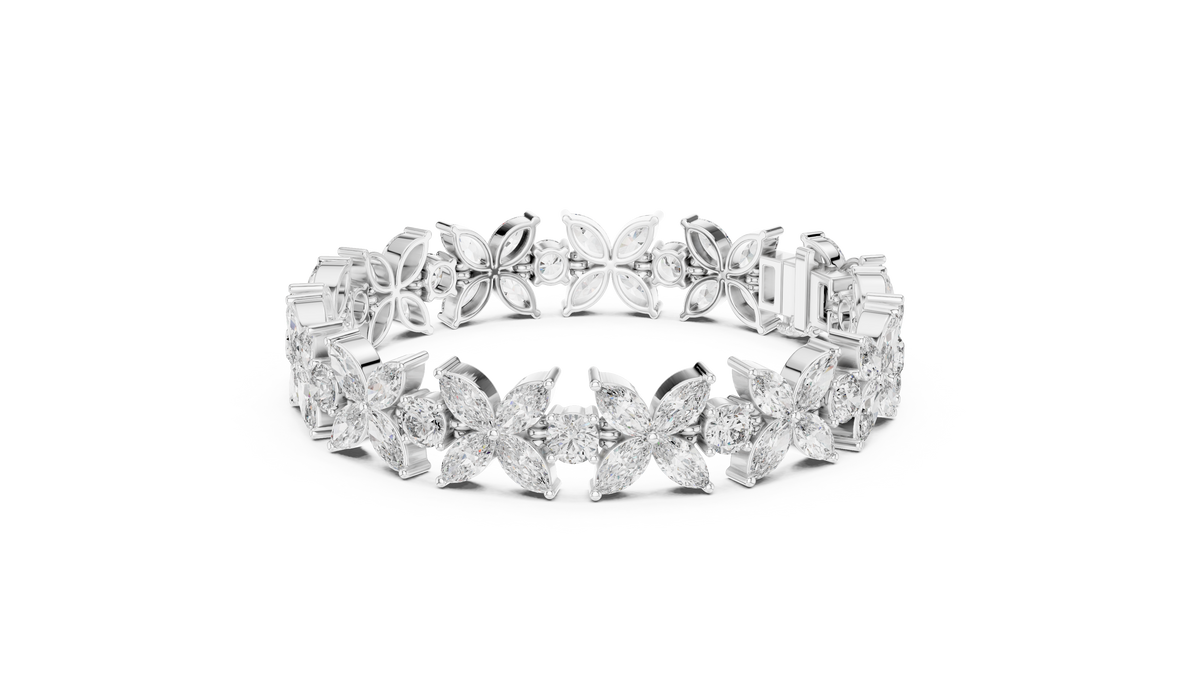 Marquise Floral Diamond Tennis Bracelet featuring sparkling flower motifs crafted with marquise-cut and round brilliant stones in a polished white gold finish by Orova Jewels.